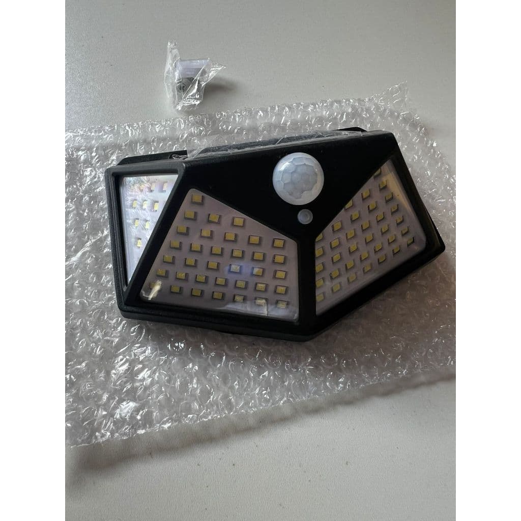 Luminária Refletor LED SOLAR 100 LEDs BD-100LED com Sensor de Presença. Ilumine sua casa e economize
