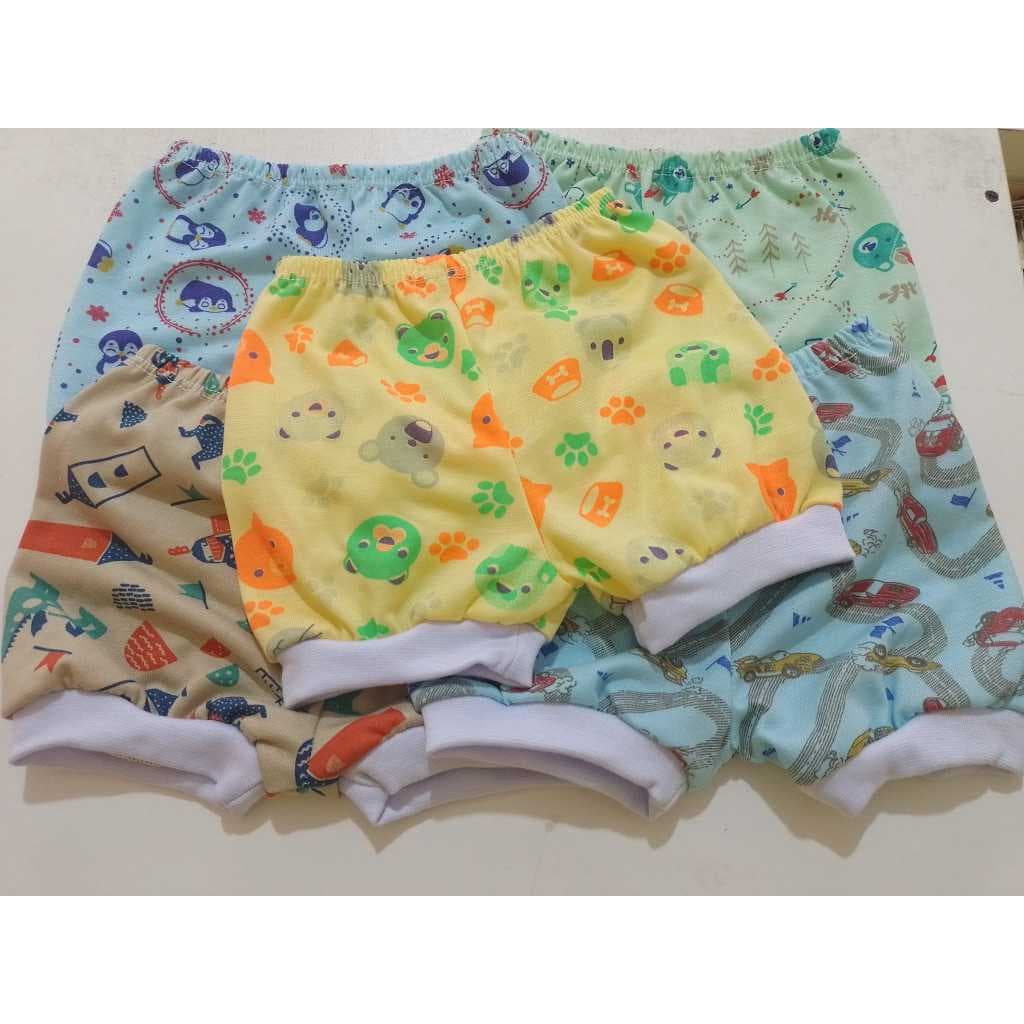 Kit com 4 shorts com ribana tapa fralda bebê menino e menina em poliéster  Tamanho P.M.G