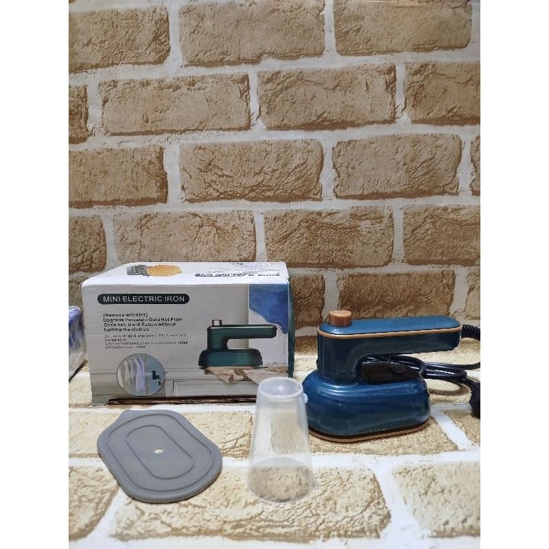 Mini ferro de passar a vapor