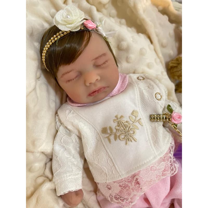 bebe reborn silicone solido mama faz xixi chupeta de verdade molinha olhos fechados dormindo loulou 34 cm