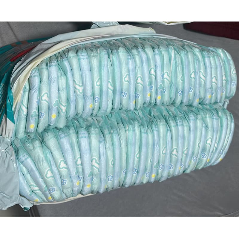 fralda Pampers xxxg