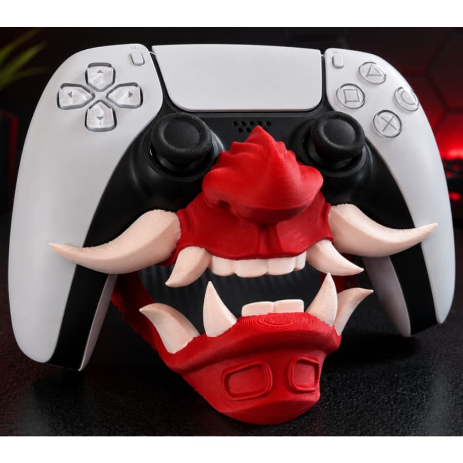 Suporte de controle de videogame inspirado em uma mascara de oni