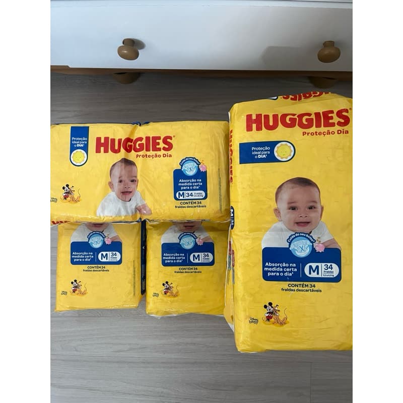 6 pct de Fralda Huggies M - 34 unidades cada