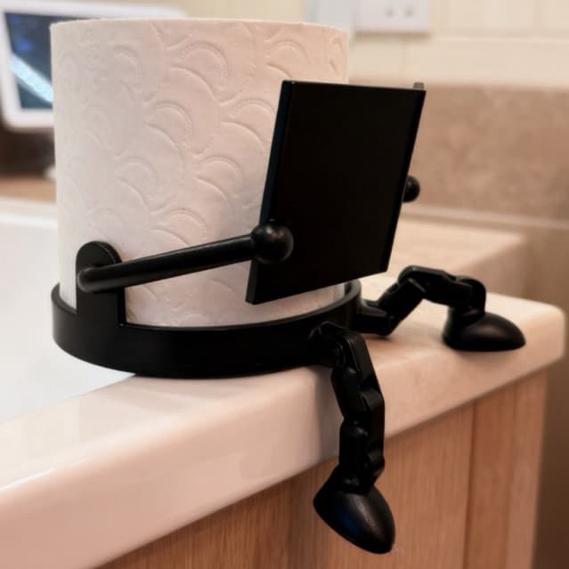 Porta Papel Higiênico Articulado Boneco Leitor - Divertido e Criativo (Preto/Branco)