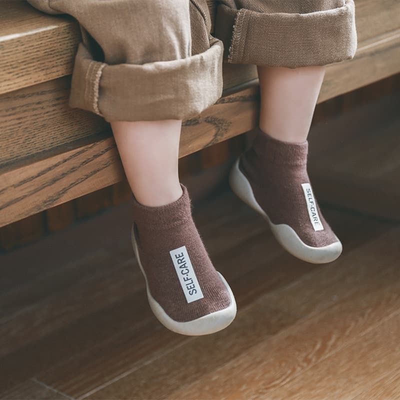 Sapatos De Bebê Primeiros Andadores Novo Unissex Primeiro Andador Crianças Sola De Borracha Macia Sapato Preto Botas De Malha Antiderrapante