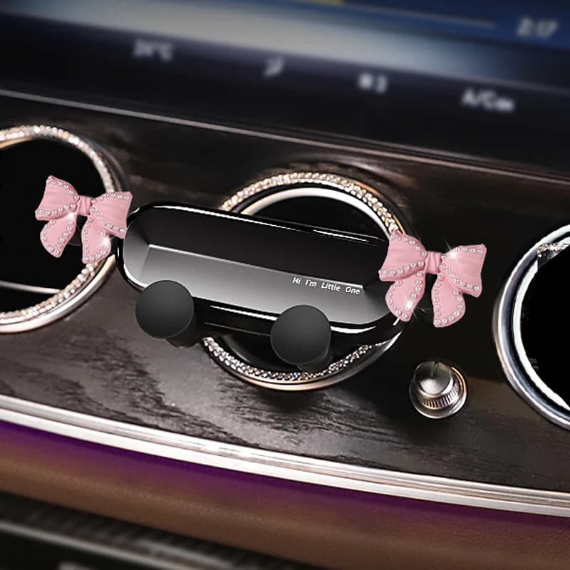 Bonito Bowknot Universal Suporte Do Telefone Carro Dos Desenhos Animados Diamante GPS De Gravidade Auto Ventilação Ar Cl