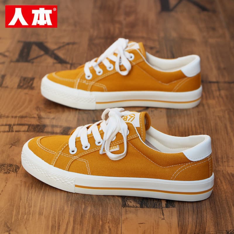 Sapatos de lona amarelo humano feminino 2026 primavera novo baixo-topo estudante Casual tênis esportivos All-Match tênis