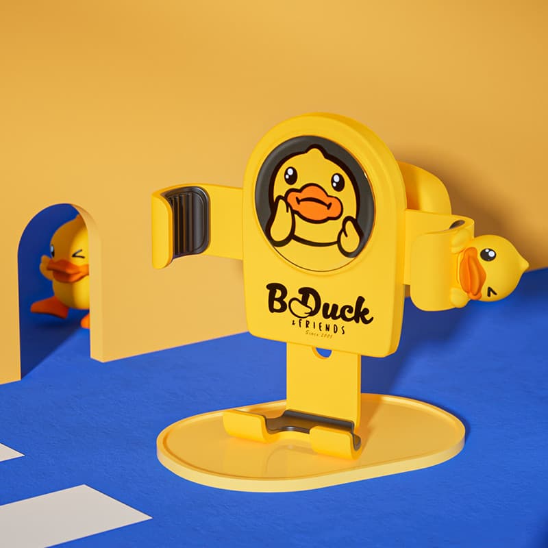 Pequeno pato amarelo suporte do telefone móvel do carro saída de ar navegação suporte do telefone móvel carro fixo Inter