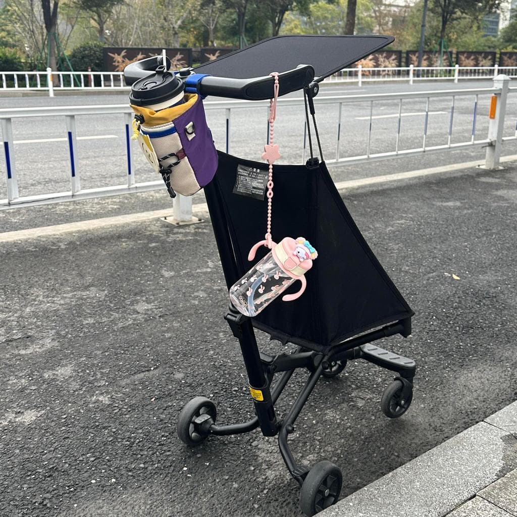 Ferramenta útil para armazenamento de mamadeiras para carrinho de bebê!Fora carrinho de bebê bolso carro pendurado garra
