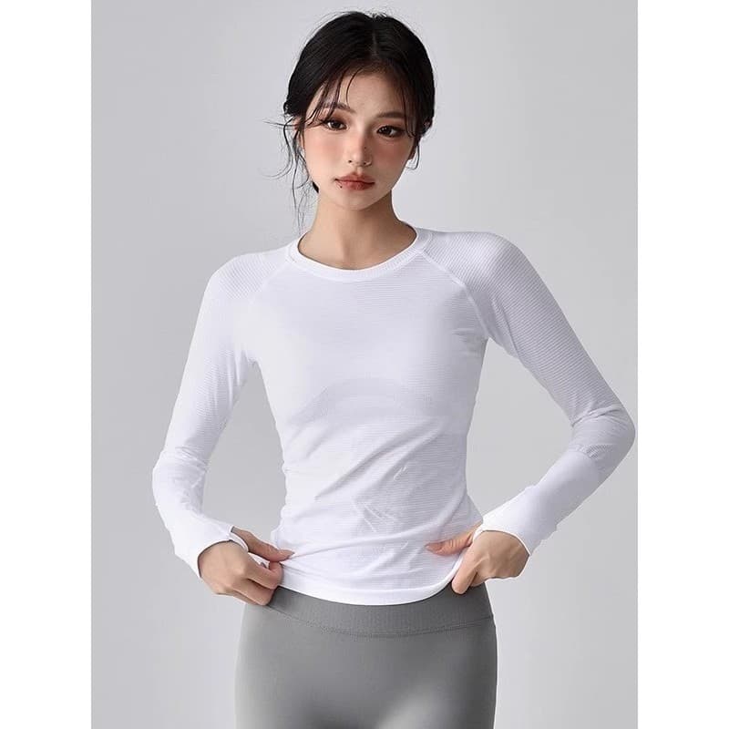 Roupas de Fitness femininas 2026 novo estilo roupas de Yoga fino-ajuste mais magro olhar de manga comprida de alta elast