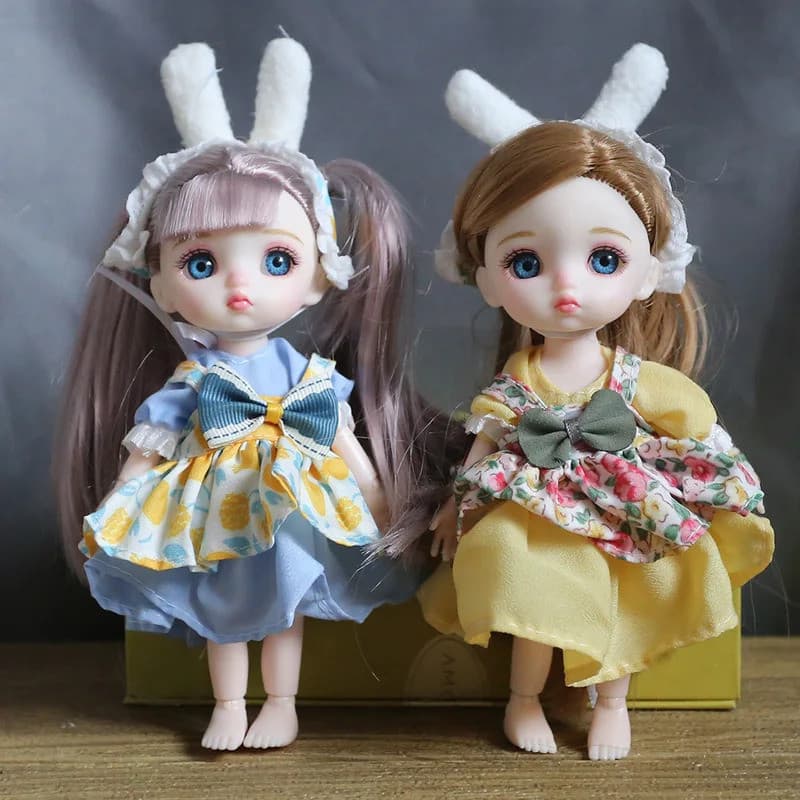 16cm Olhos Azuis BJD Boneca Lolita Vestido 13 Bonecas Articuladas Sorriso Rosto Redondo Brinquedos Menina Conjunto Compl