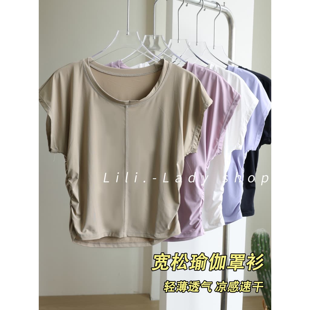 Roupas de Yoga femininas 2026 novo estilo Pilates bonito roupas de treinamento de secagem rápida Fitness topos correndo 