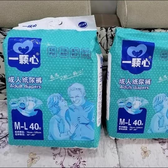 Fraldas adultas espessadas para adultos para idosos Fraldas pegajosas para homens e mulheres Fraldas descartáveis para a