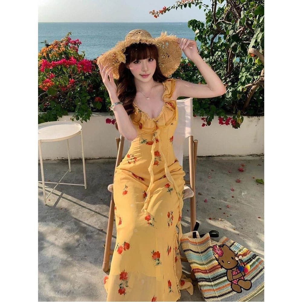 Vestido francês à beira-mar férias estilo Floral estilingue vestido feminino Super fada High-End Fishtail vestido longo