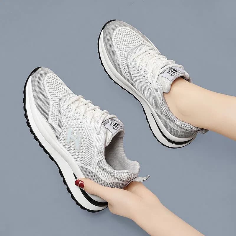 Almofada de ar tênis feminino primavera tênis de viagem sapatos femininos 2026 novo estilo tênis malha respirável primav